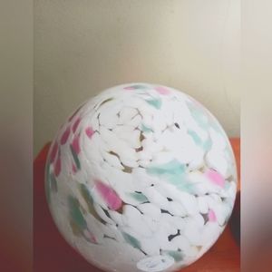 White round pink and turquoise glass ball. Decoration